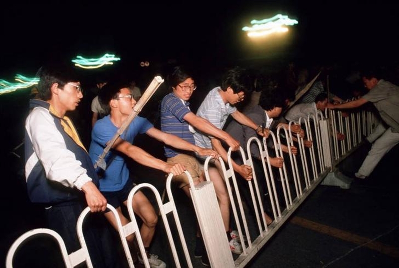 Tiananmen Square protests 19890604 - reform demonstrators pull barricades across Changan Avenue