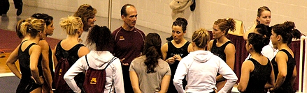 gymnastics team & coaches