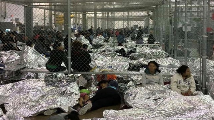 Overcrowded fenced area holding families in McAllen, Texas on June 11, 2019