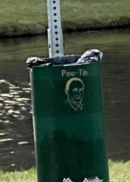 Poo-Tin - pet waste container. Ask for it by name. Poo-Tin. Or Poop-tin. Either way, it stinks.