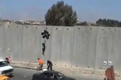 west Banksy paints West Bank wall