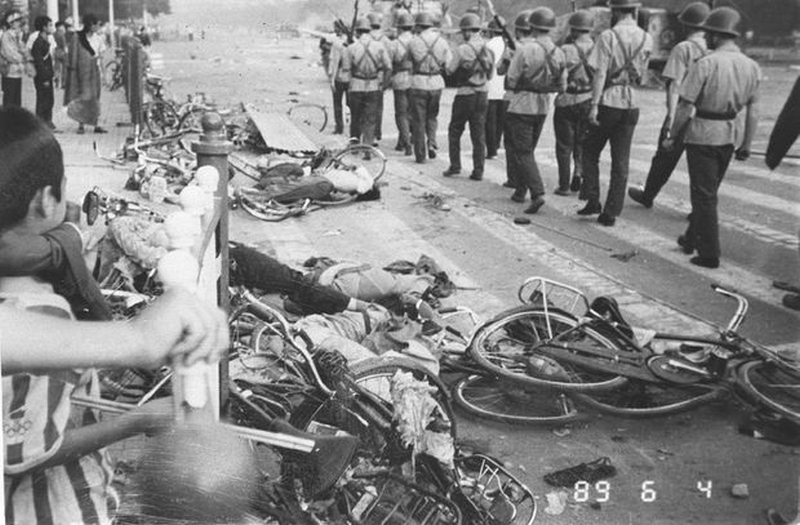 Tiananmen Square protests 19890604 - bodies and bikes litter the streets