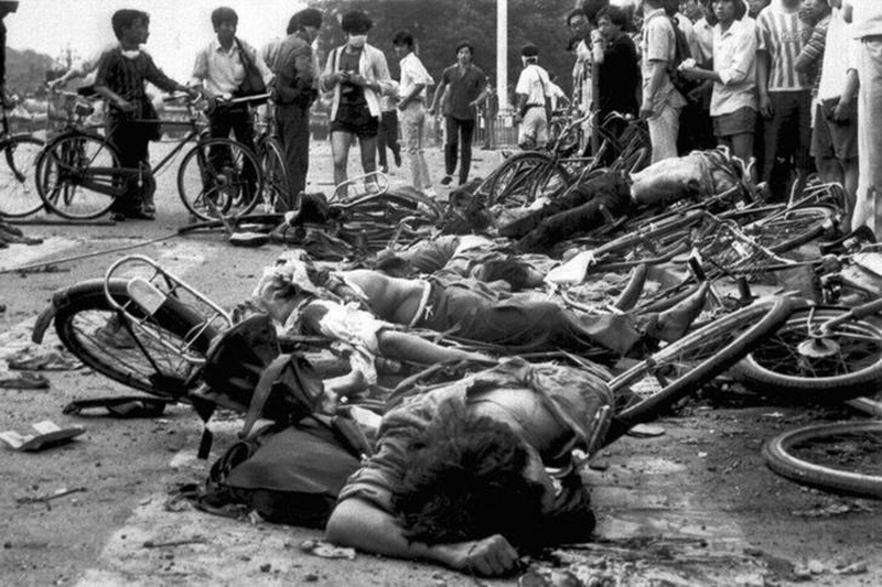 Tiananmen Square protests 19890604 - more bodies and bikes litter the streets