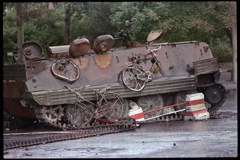 Tiananmen Square protests 19890604 - armoured personnel carrier with crushed bikes stuck to its side